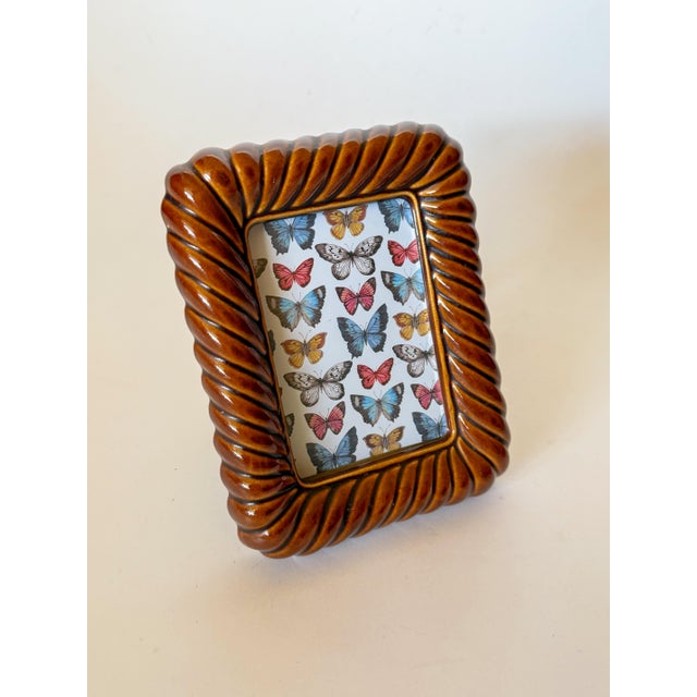 Stylish chocolate brown ceramic rope twist picture frame. On trend, but vintage! This charming piece will add some texture...
