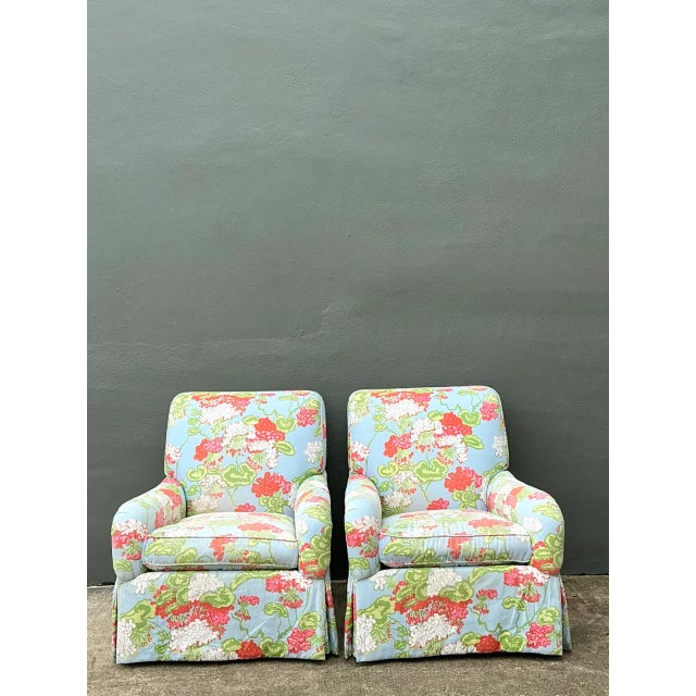 These vintage floral upholstered armchairs bring a cheerful mid-century presence to a living room or seating area. Offered...