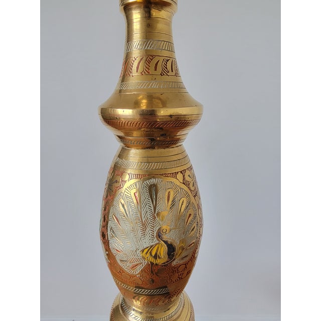 Beautiful hand painted peacock and floral design. Approximately Length 52 inch Base diameter 9 inches Width/depth 4 inches...