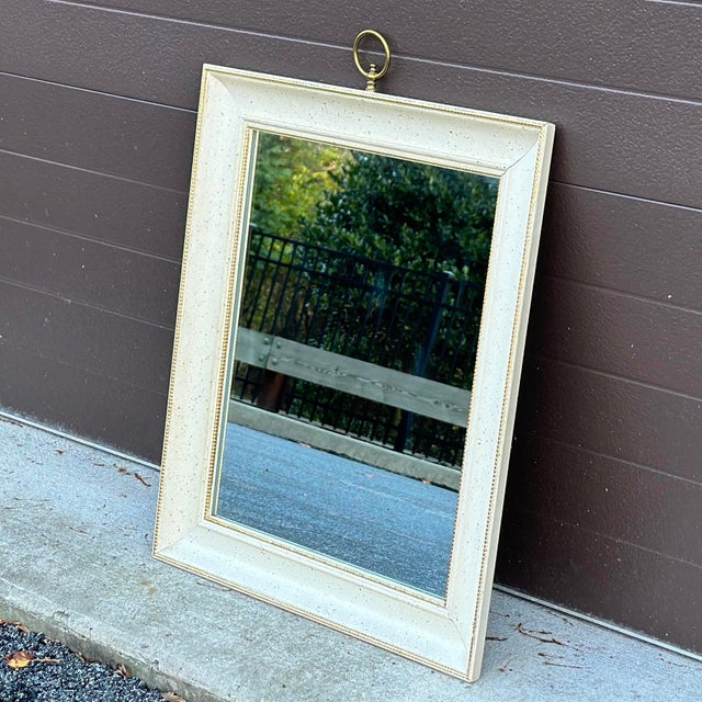 Wall Mirror With Brass Ring Finial by Turner Mfg. Co. Chicago Frame with gold splatter finish over white Mirror view 15.5”...