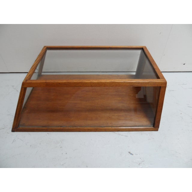 Vintage Oak Bakery Display Cabinet, 1920s, in Very Good conditions. Designed 1920 to 1949