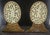A beautifully crafted pair of antique Chinese carved jade bookends, each featuring an oval pierced jade panel mounted in...