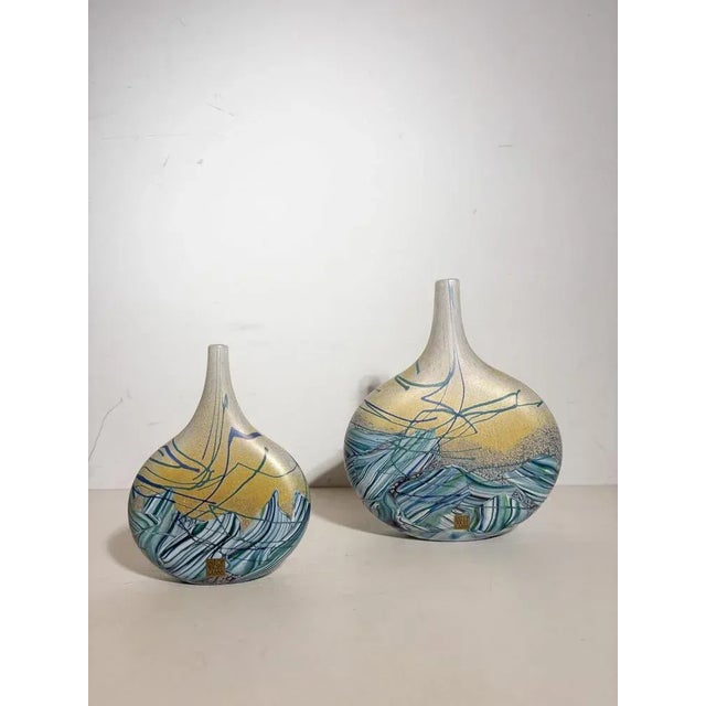 These beautiful vases are produced by Isle of Wight Studio Glass, the iconic studio founded by Michael Harris (1933–1994)....