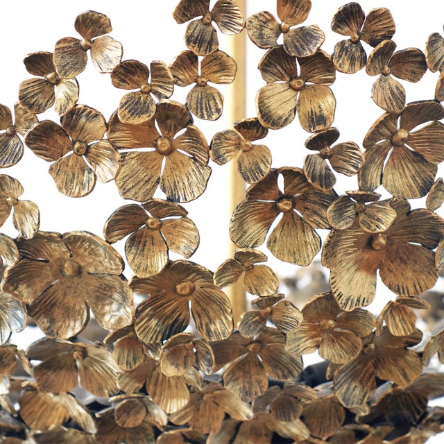 With its lacy edge and feminine but substantial design, this uplit dish light made of hand-formed blossoms adds a dramatic...