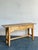 Bring the enduring charm of the French countryside to your home with this vintage knotty pine console table. Crafted from...
