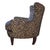 A bold and sophisticated armchair upholstered in a rich leopard print fabric, offering a modern take on classic statement...