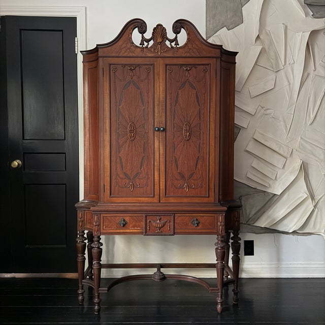 Remarkable Early 20th Century American cabinet by Peck & Hills with exquisite carved details and bronze/turquoise...
