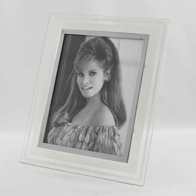 This stunning French glass picture photo frame features a transparent and frosted glass slab with a geometric design and...