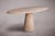 Introducing our exquisite Travertine Dining Table with a single conical leg. Crafted with precision and elegance, this...