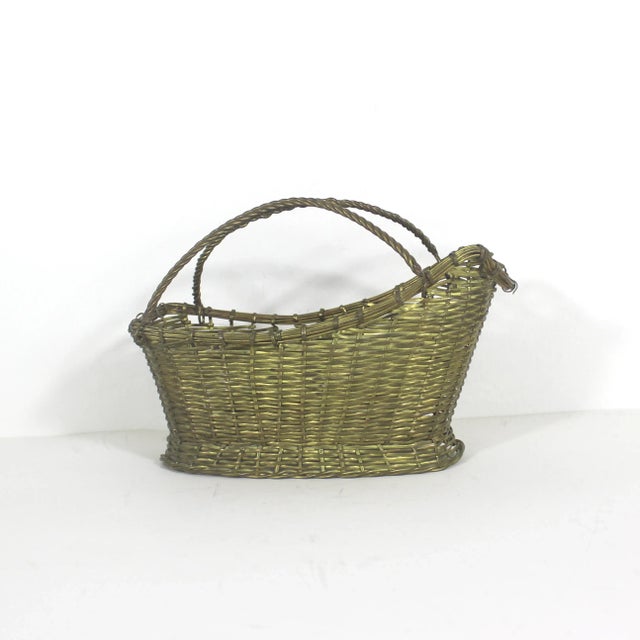 Great vintage woven brass wine bottle carrying basket or holder. In very good vintage condition with some patina and small...