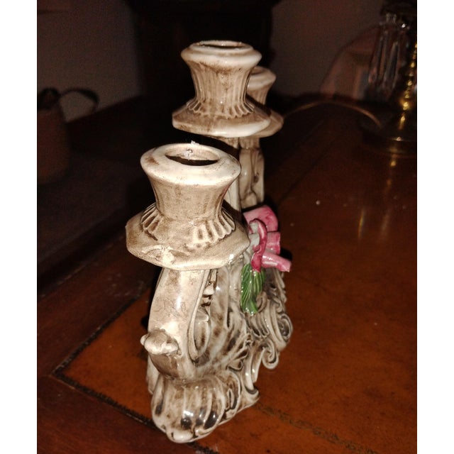 Elegant vintage Italian Capodimonte 3 arm candelabra. Porcelain rose adored scrolled piece. It has been signed by maker....