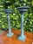 Striking pair of Maitland-Smith candleholders inspired by classical architectural columns. Finished in a richly layered...