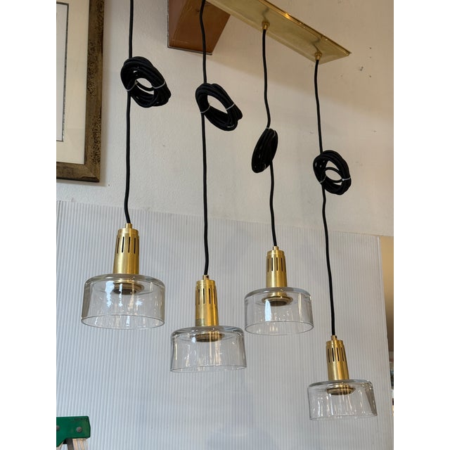 2020s Visual Comfort Iris Quatro Linear Pendant in Hand Rubbed Antique Brass With Clear Glass For Sale - Image 5 of 12