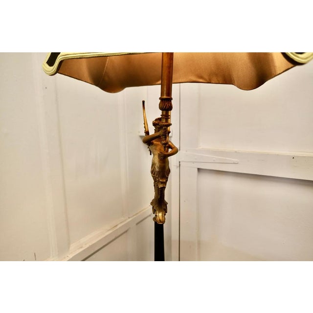 Oval Shaped Walnut Occasional Table, with Undertier. This useful little table has a very pretty shape, it has a scalloped...