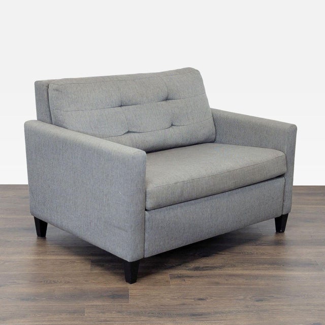 This Crate & Barrel sleeper sofa is perfect for any living space. It features a modern gray fabric design and easily...