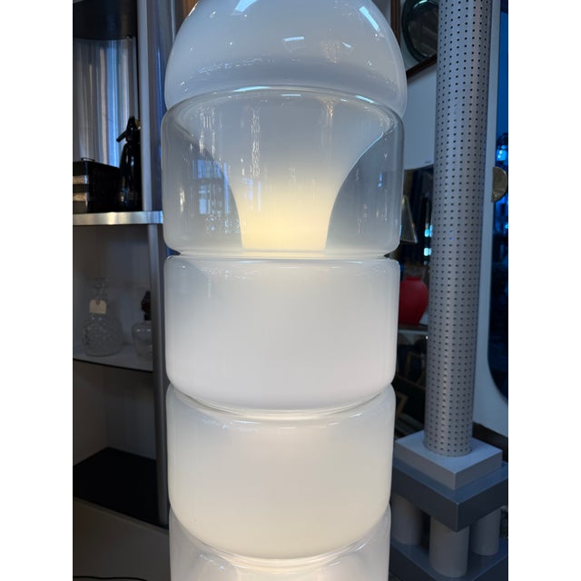 Sculptural LT316 “Sfumato” floor lamp designed by Carlo Nason for Vetrerie Nason, Italy. Composed of stacked cylindrical...
