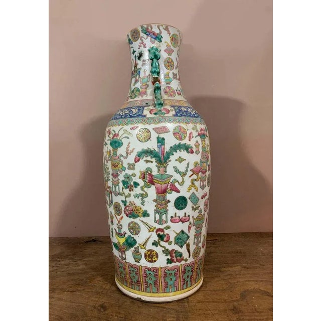 This beautiful baluster vase is made of Cantonese porcelain, manufactured in China in the late 19th century. Canton...