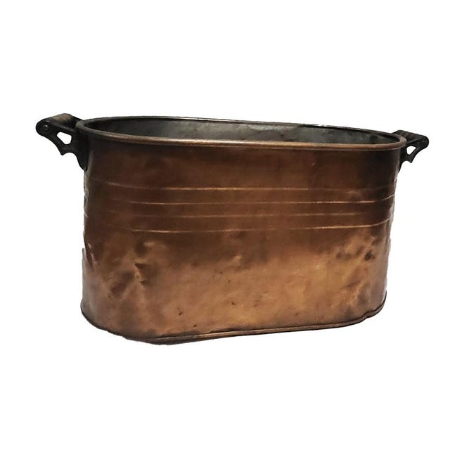An authentic 19th to early 20th-century American antique copper boiler wash tub, showcasing a warm, beautifully aged...