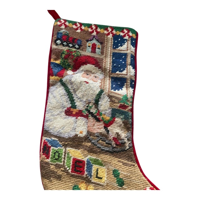 Vintage needlepoint Christmas holiday stocking featuring Santa Claus making his naughty and nice lists; the word "Noel" is...