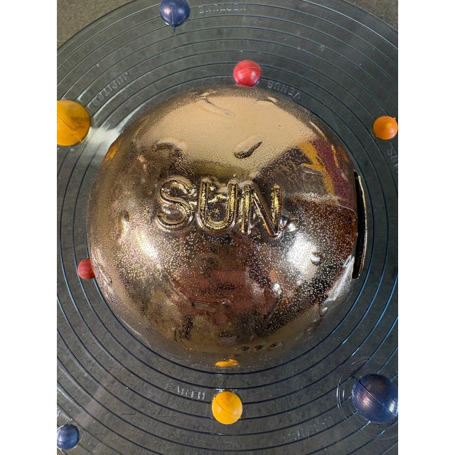 Rare 1960s solar system coin bank produced by Vacumet Inc from St. Clair, MI. Serves as a coin bank and a brilliant desk...