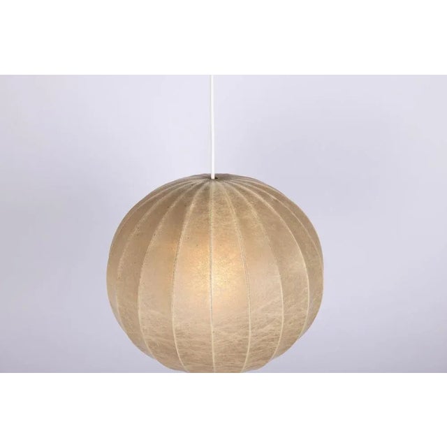 Rare Mid-Century Modern Cocoon Pendant Light by Goldkant Leuchten, Germany, 1960s An exceptional example of mid-century...