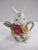 A highly collectable Royal Albert “Old Country Roses” bunny tea pot. This piece features a spout in the form of a pink...