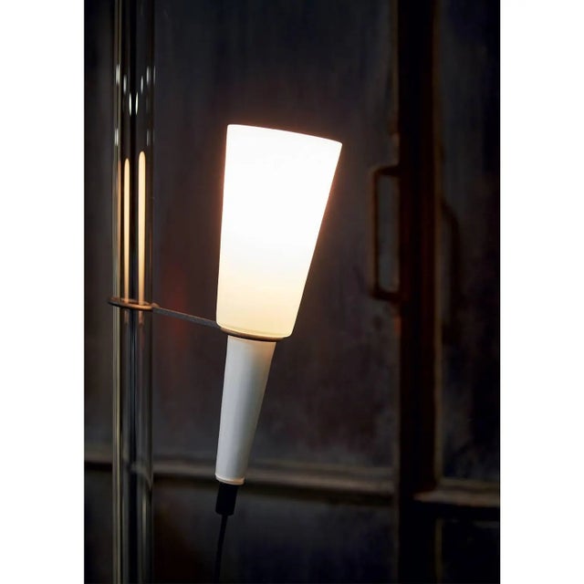 Floor lamp of clear mouth blown Murano glass illuminating body and rod, the illuminating body is adjustable in height,...