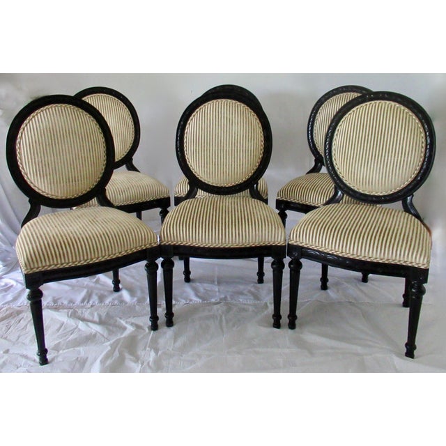 Vintage: C.1993, Set of 8 Neoclassical Style Dining chairs, in a Satin Ebony Finish to Frames, while the FRONTS are...