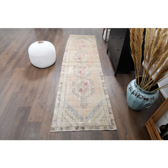 Vintage Hand-Knotted area rug is a semi-antique vintage area rug. The '70s Eastern region of Anatolian's unique rug is...