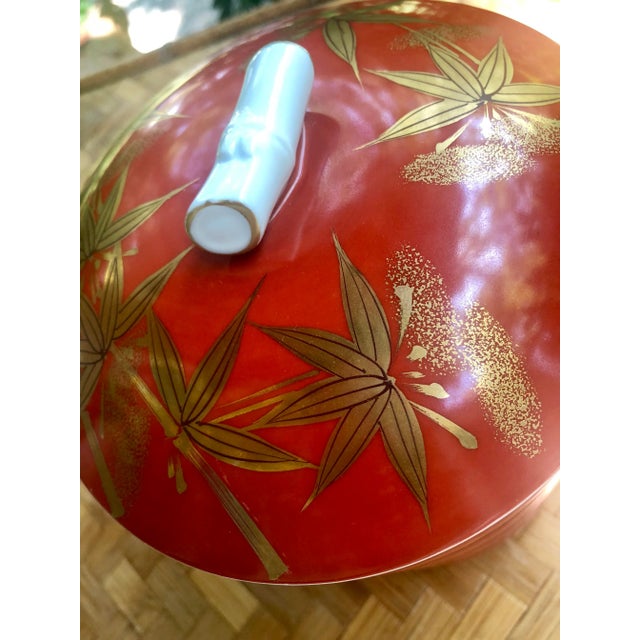 What bento box! Very collectible Jubako stackable bowls. Hand painted detailing with Gilt bamboo motifs throughout. No...