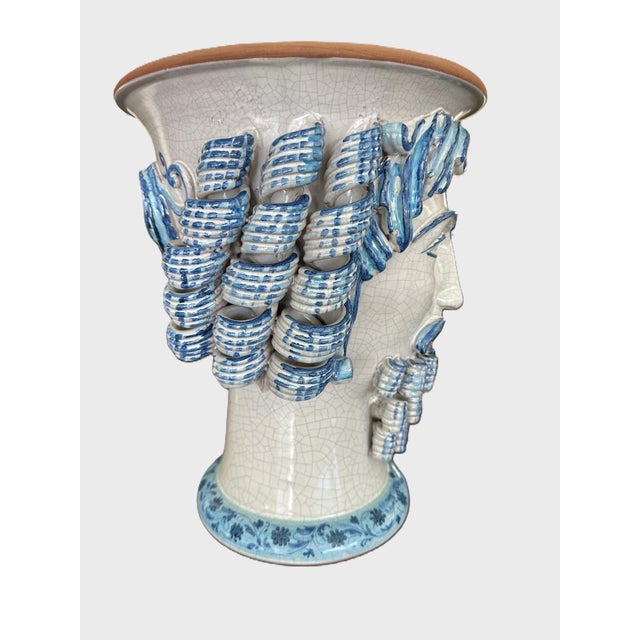 Handcrafted in the tradition of Sicily's celebrated Testa di Moro ceramics, this striking sculptural planter features the...