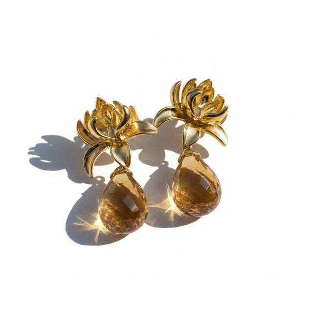 Lotus Citrine Drop Earrings. Natural Citrine Lotus Flower Drop Earrings. Inspired by the graceful bloom of a lotus flower,...