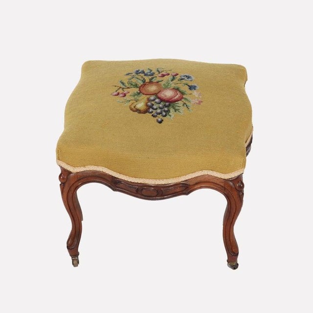 Antique Rococo Revival Rosewood Footstool with Floral Needlepoint C1890 Measures - 14 h x 18 w x 18 w A charming antique...
