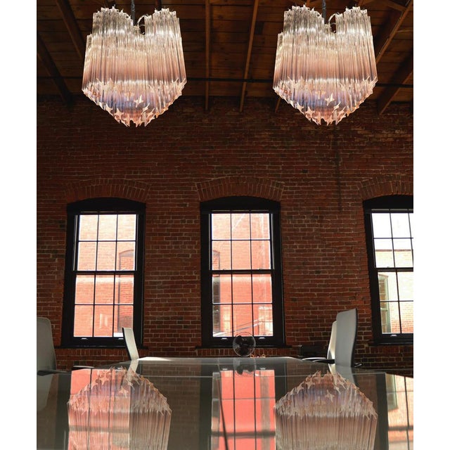 Pair Murano glass chandelier, spiral shape, very elegant, 60 pink quadriedri on nickel metal frame. This Mid- Century...