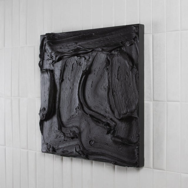 A captivating exploration of depth and dimension, this abstract textural painting by Michael Allen is a striking statement...