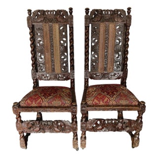 Pair of Antique Renaissance Revival Carved Wooden Chairs For Sale