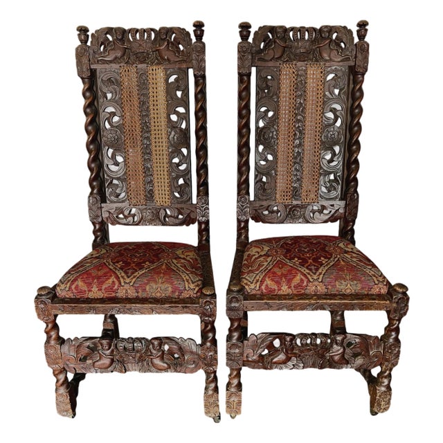 Pair of Antique Renaissance Revival Carved Wooden Chairs For Sale