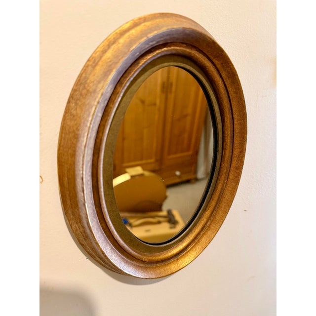 Bring classic European elegance to your interior with this pair of petit Italian gilt oval mirrors. Beautifully crafted,...