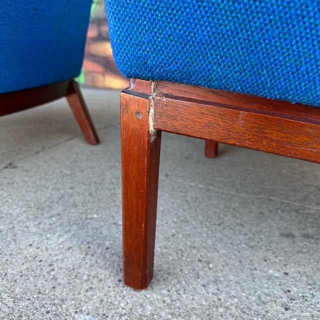 Pair of lounge chairs designed by Erik Kolling Andersen. These chairs have a great mid century modern angular silhouette...