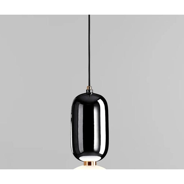 Jaime hayon aballs t me black suspension lamp for parachilna shiny and eye-catching collection. Matching two nobel...