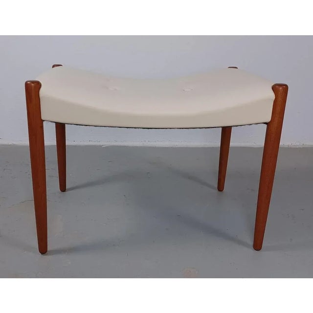 1950´s Reupholstered Danish footstool in teak and cream leather Danish footstool from the 1960´s in solid teak with...