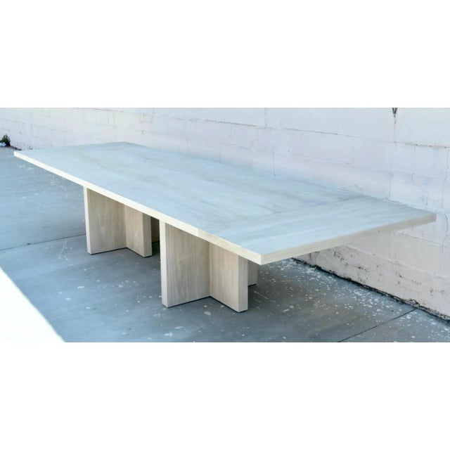 This walnut dining table is seen here in 120" W x 48" D x 30" H with two 20" extensions, expanding to 160" We use only...