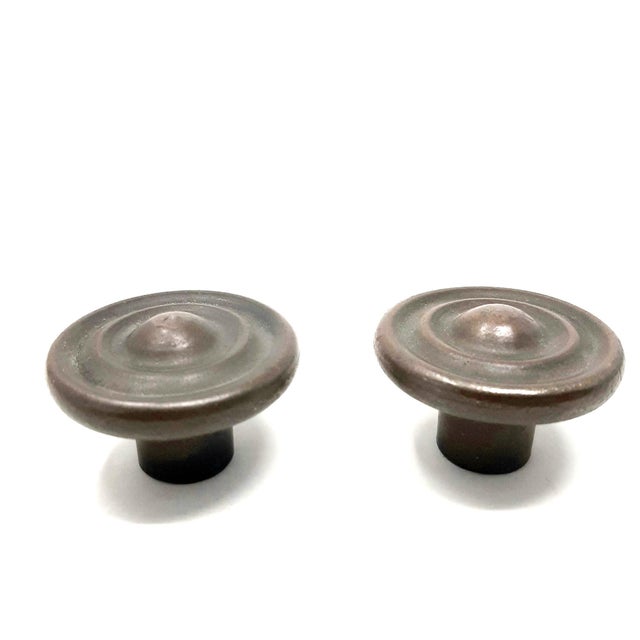 These circular handles could be used on a dresser, cabinet door or as a drawer pull. No markings, maker is unknown....