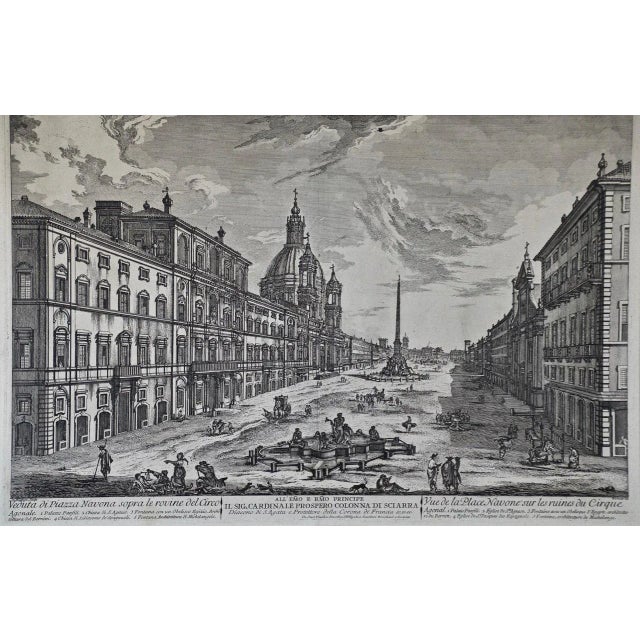 This early 19th century etching entitled "Veduta di Piazza Navona sopra le rovine del Circo" was created by Jean Barbault...