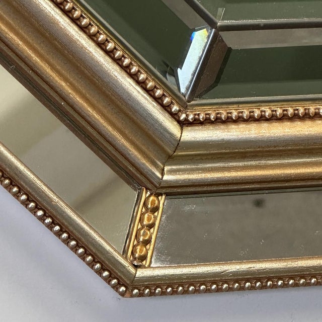 Elegant octagonal wall mirror designed by De Knudt, Belgium, circa 1980s.De Knudt is celebrated for its high-quality...
