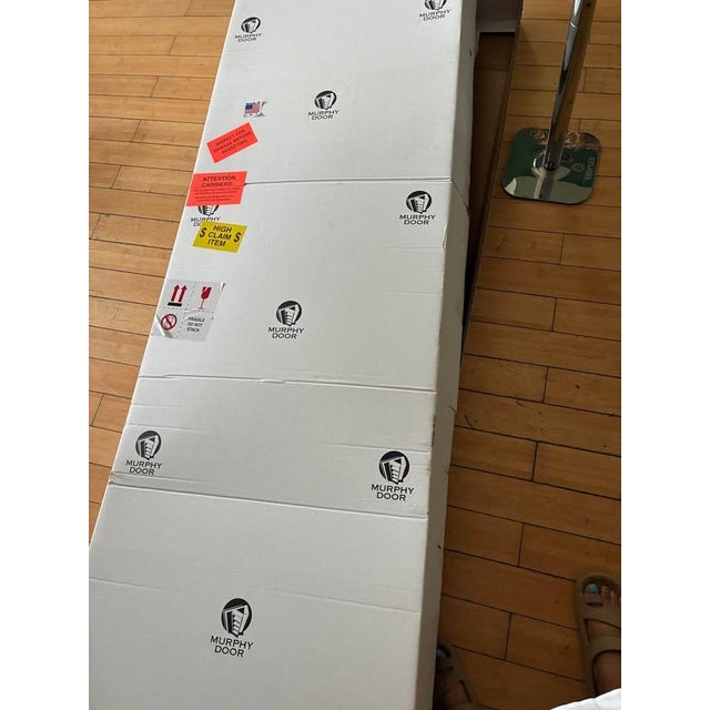 Selling an authentic Murphy Door hidden bookcase after receiving a replacement due to the manufacturer sending us the...