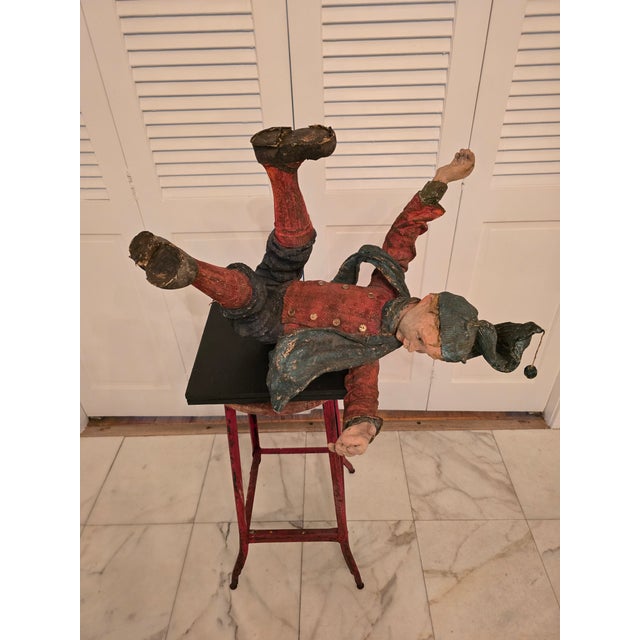 A very rare vintage pre mid century era folk art sculpture of a falling young figure . Absolutely a fine art vintage piece...