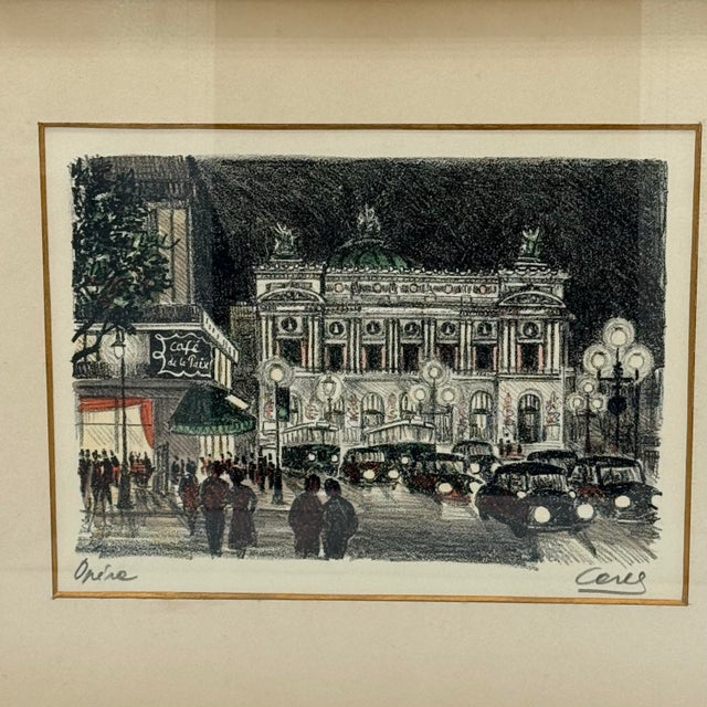 The Skinny A moody, romantic view of Paris at night, capturing the glow of the Opera district and the energy of the Café...