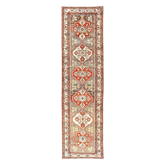 Antique Persian Bakhtiari Runner With Bold Geometric Medallions in Terracotta For Sale