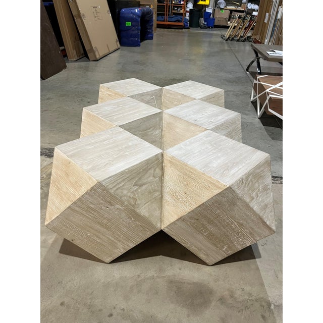 The CFC "Icosahedron" coffee table is made from reclaimed wood and finished in a whitewash. The nature of reclaimed wood...